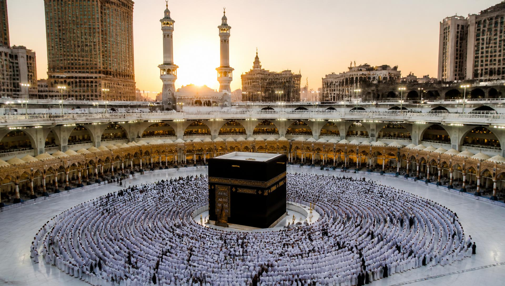 Pilgrims in ihram circling the Kaaba at dawn